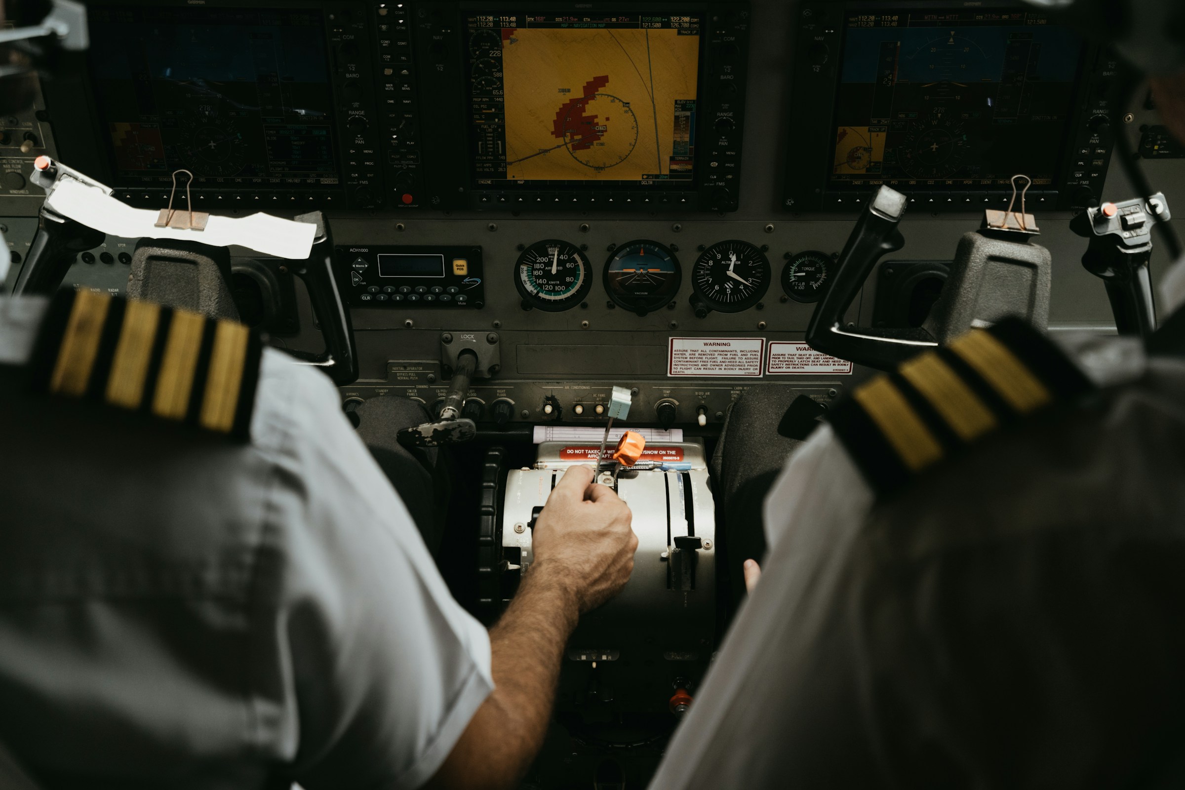Flight crew in an aircraft cockpit